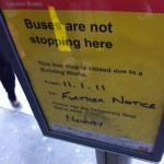 official sign at a bus stop signaling that the bus stop will not be used “until further notice” and that the replacement stops are “nearby”